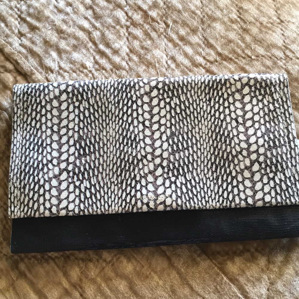 Authentic coach leather embossed clutch